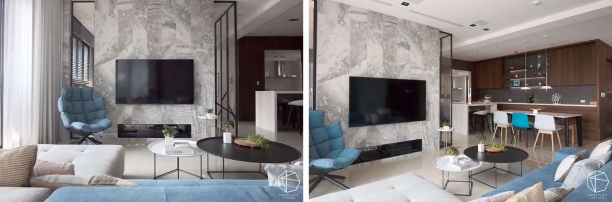 电视墙尽量呈现简单造型，以意大利进口壁砖做切割，衍生天然的石纹肌理，并发挥建材的通透性，以灰镜与玻璃做拼接，让人可从电视墙看到后方书房，形构延伸的开阔的视线。